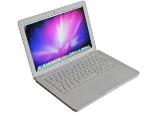 2009 Apple MacBook (MC207B/A) on white background.