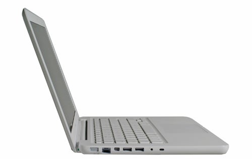 Side view of white Apple MacBook 2009 model.