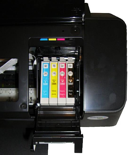 Epson Stylus S21 inkjet printer with open ink cartridge compartment.