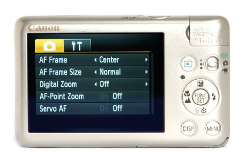 Canon Digital IXUS 120 IS camera back view showing LCD screen and controls.