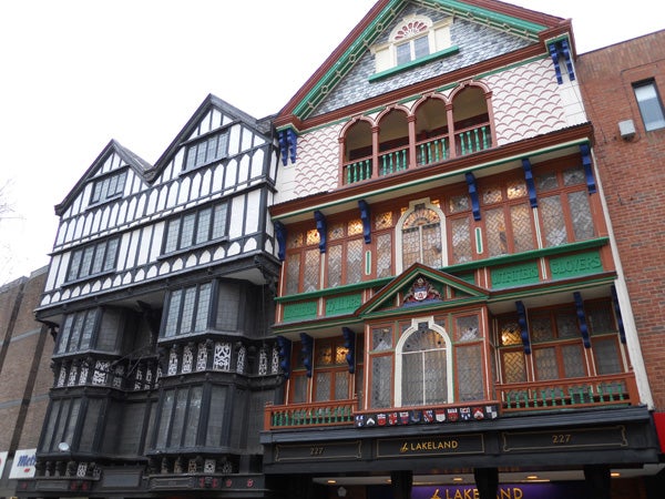 Photo taken with Nikon Coolpix S570 of intricate Tudor-style buildings.