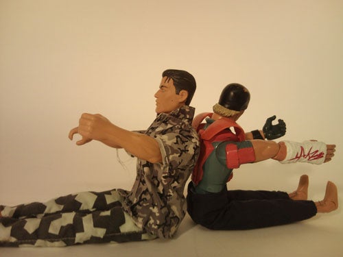 Action figures posed to imitate driving.
