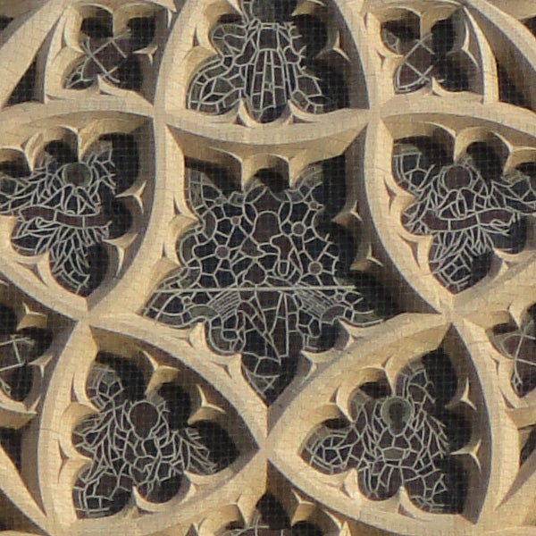 Intricate stone lattice window design.