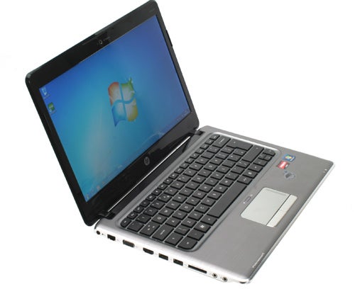 HP Pavilion dm3-1020ea laptop with screen displaying Windows desktop.