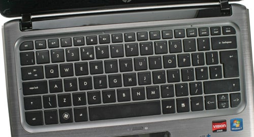 HP Pavilion dm3-1020ea laptop keyboard and touchpad close-up.