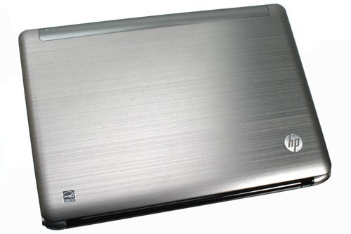HP Pavilion dm3-1020ea laptop with brushed metal cover.