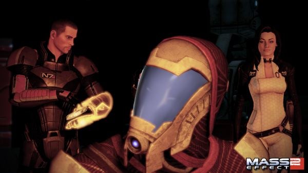 Characters from Mass Effect 2 video game during a scene.