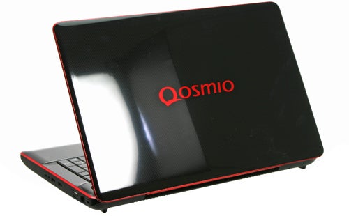 Toshiba Qosmio X500-10T laptop with red and black design.