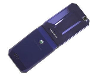 Sony Ericsson Jalou F100i flip phone on white background.