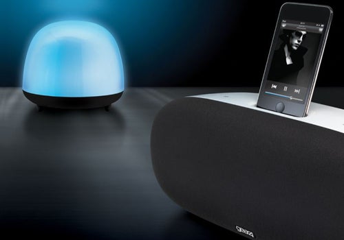 Gear4 SoundOrb Aurora speaker with glowing blue dome and docked iPod.