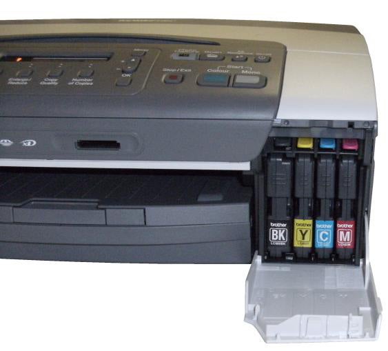 Brother DCP-365CN printer with open ink cartridge compartment.