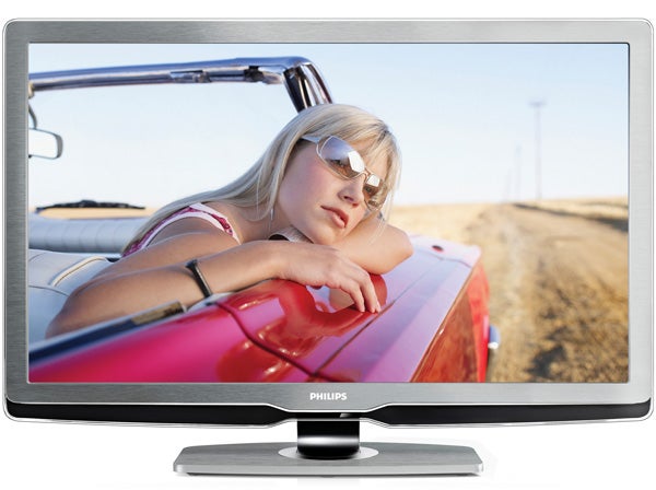 Philips 40PFL9704 LCD TV displaying a vibrant car scene.