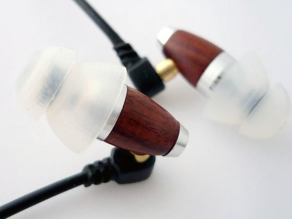 Sleek Audio SA1 earphones with wooden accents and clear silicone tips.