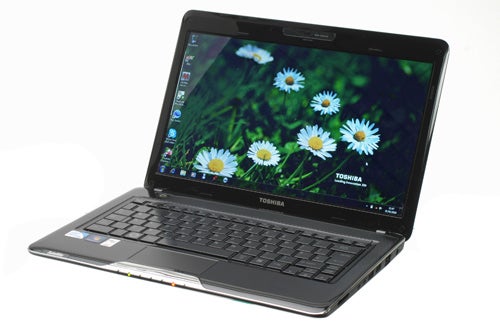 Toshiba Satellite T130-11H laptop with open screen displaying desktop wallpaper.