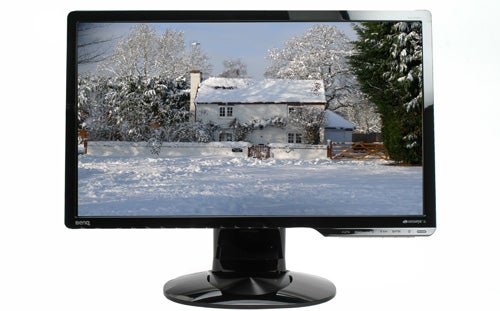 BenQ G2222HDL monitor displaying a snowy landscape image.