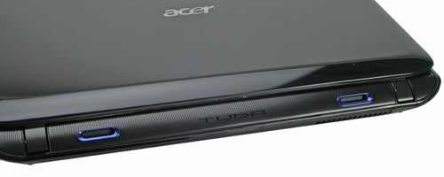 Close-up of Acer Aspire 5942G laptop corner with USB ports.