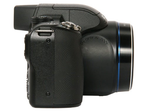 Samsung WB5000 digital camera side view showing lens and grip.