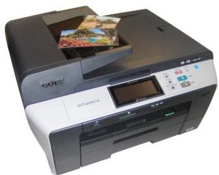 Brother DCP-6690CW inkjet printer with a printed photo.