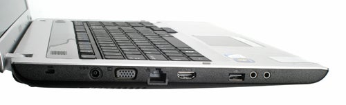 Side view of Samsung R730 laptop showing ports and keyboard.Samsung R730 laptop showing keyboard and side ports.