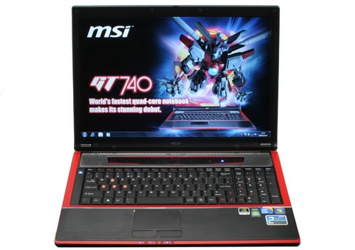 MSI GT740 gaming laptop open with screen displaying graphics.