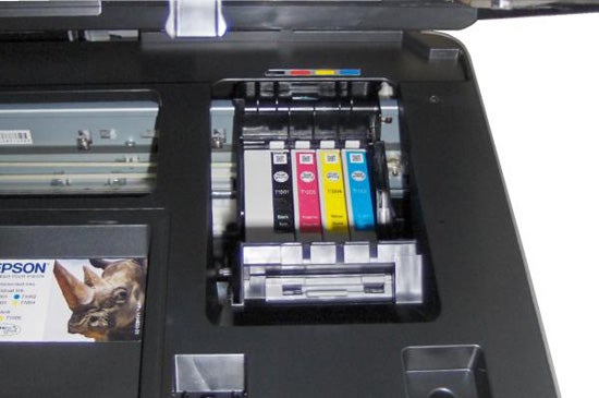 Epson Stylus Office BX610FW showing open ink cartridge compartment.