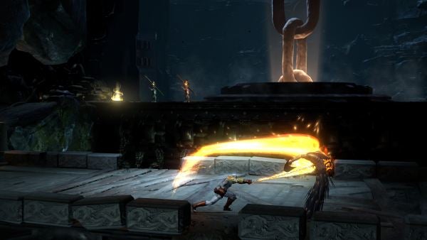 Kratos wielding Blades of Exile in God of War III scene.