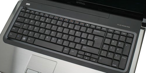Dell Inspiron 1764 laptop keyboard and touchpad close-up.