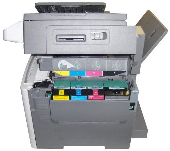 Lexmark X543dn laser printer with open toner cartridge tray.