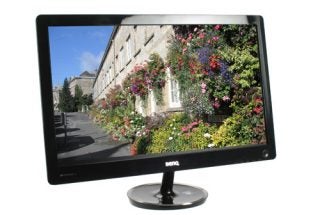 BenQ V2220 Ultra-Slim Monitor displaying colorful floral street scene.