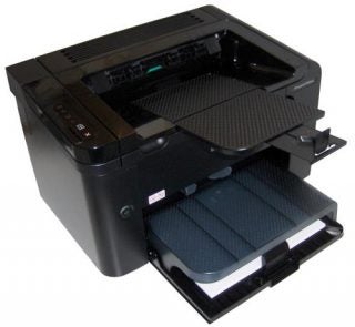 HP LaserJet Pro P1606dn printer with open input tray.