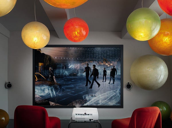 Epson EH-TW4400 projector displaying a movie scene in a home theater.