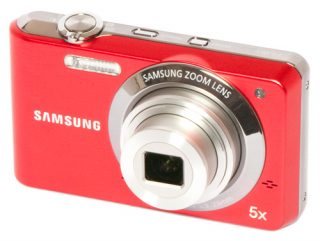 Red Samsung PL80 digital camera with zoom lens.