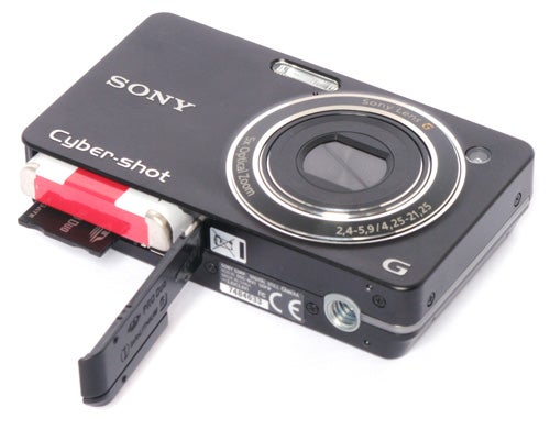 Sony Cyber-shot DSC-WX1 camera with open memory card slot.