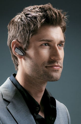 Man wearing Jabra Arrow Bluetooth Headset in his right ear.