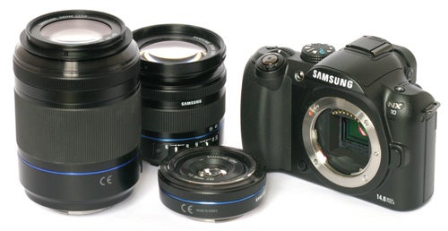 Samsung NX10 camera with three interchangeable lenses.