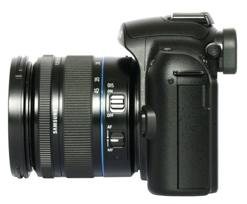 Samsung NX10 camera with lens on white background