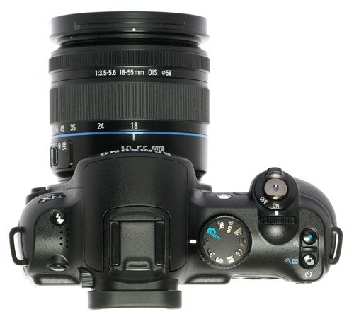 Samsung NX10 camera with attached 18-55mm lens.