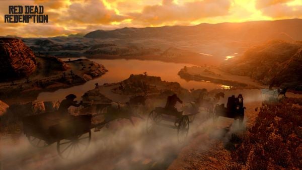 Sunset scene from Red Dead Redemption with carriages and landscape.