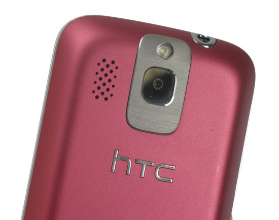 Close-up of a pink HTC smartphone camera and logo