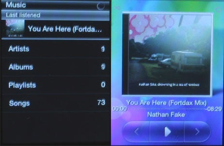 HTC Smart phone displaying music player interface.