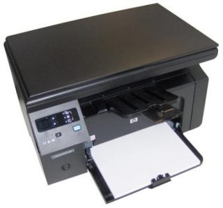HP LaserJet M1132MFP multifunction printer with output tray extended.