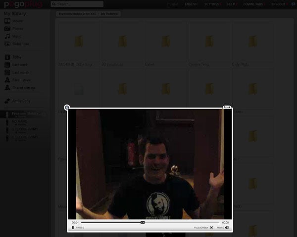 Screenshot of Pogoplug interface with a user's photo displayed.
