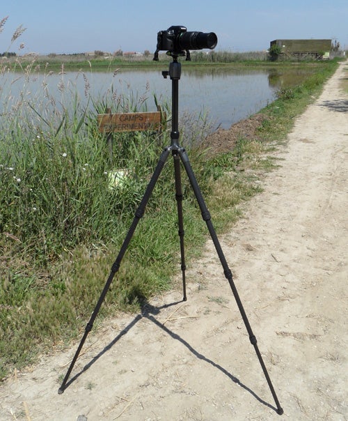 Gitzo Traveller 2 Tripod with camera beside a lake.