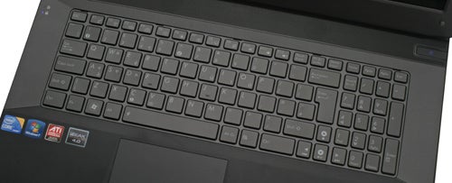 Asus G73Jh laptop keyboard and touchpad close-up.