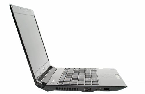 Asus UL30A laptop on a white background, side view open.