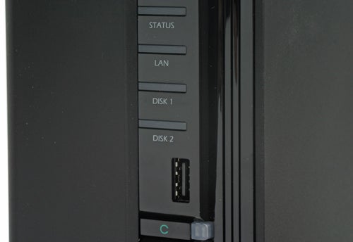 Close-up of Synology DiskStation DS210+ status indicators and ports.