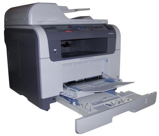 Samsung SCX-5635FN multifunction printer with open trays.