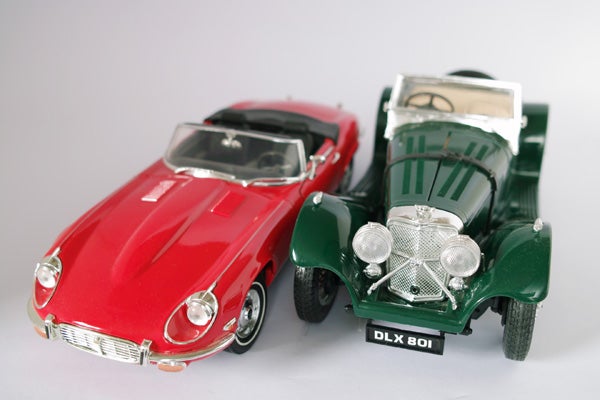 Toy model cars on white background