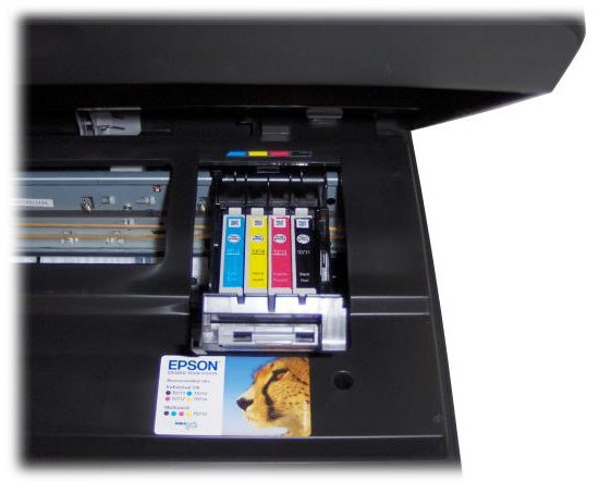 Epson Stylus SX215 printer with open ink cartridge compartment.