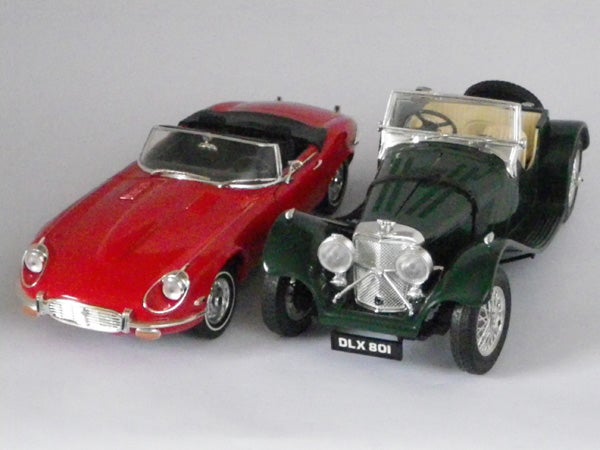 Model cars photographed with a gray background.